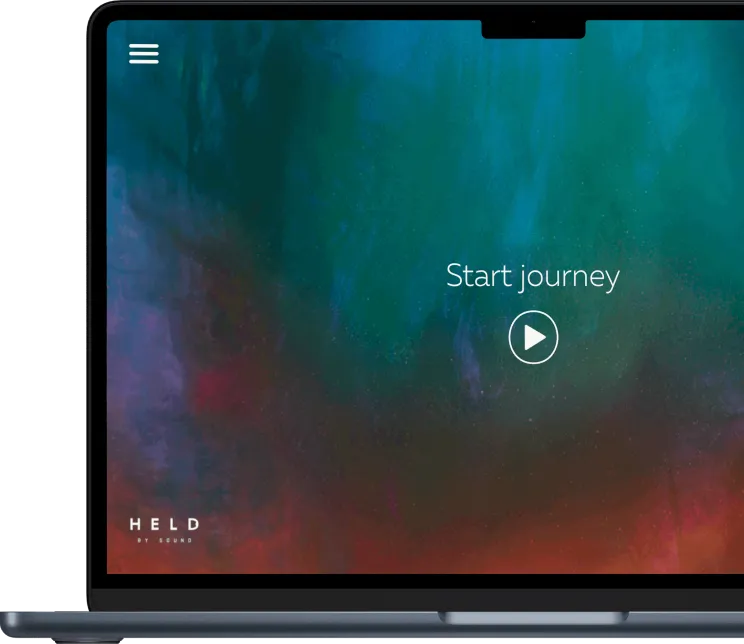 A laptop displaying the Held by Sound app